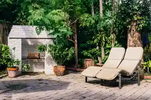 Secluded Villa - Backyard Corner with Chairs